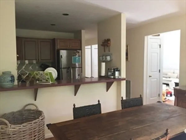 a view of living room with furniture and window