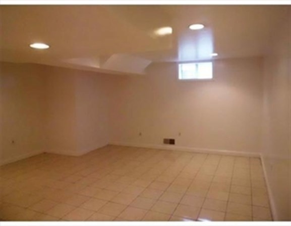 12 N Commons, Unit L Lincoln, MA 01773 - Photo 21 of 25 a view of an empty room