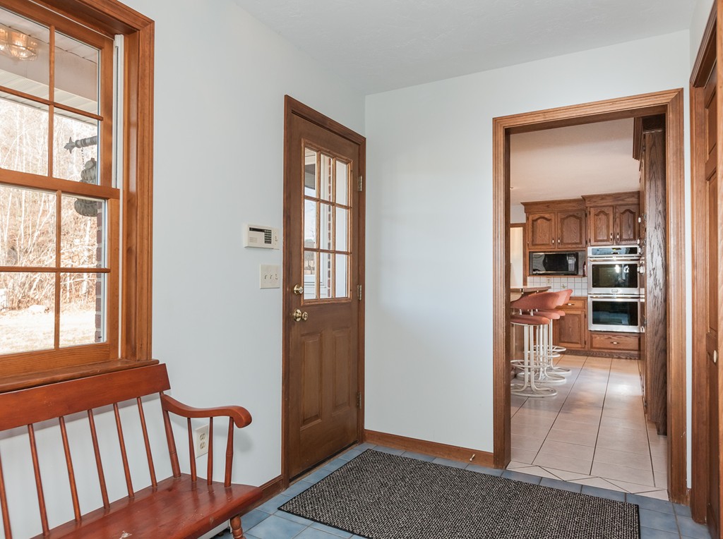 30 Main Road Montgomery, MA 01085 - Photo 11 of 30 a view of a hallway and a livingroom with wooden floor and dining room view