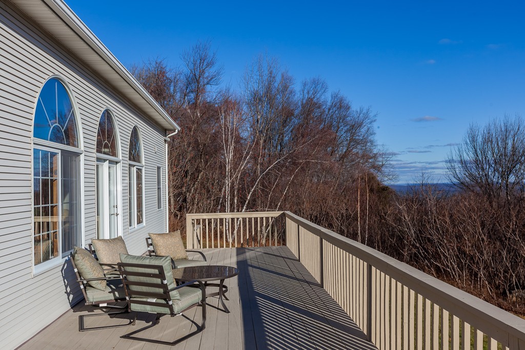 30 Main Road Montgomery, MA 01085 - Photo 4 of 30 a view of balcony with furniture and trees