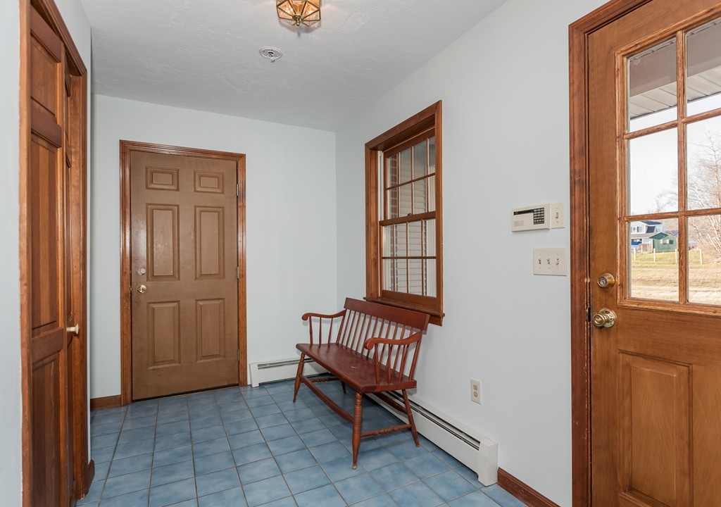 30 Main Road Montgomery, MA 01085 - Photo 8 of 30 a view of a hallway with windows and a bedroom