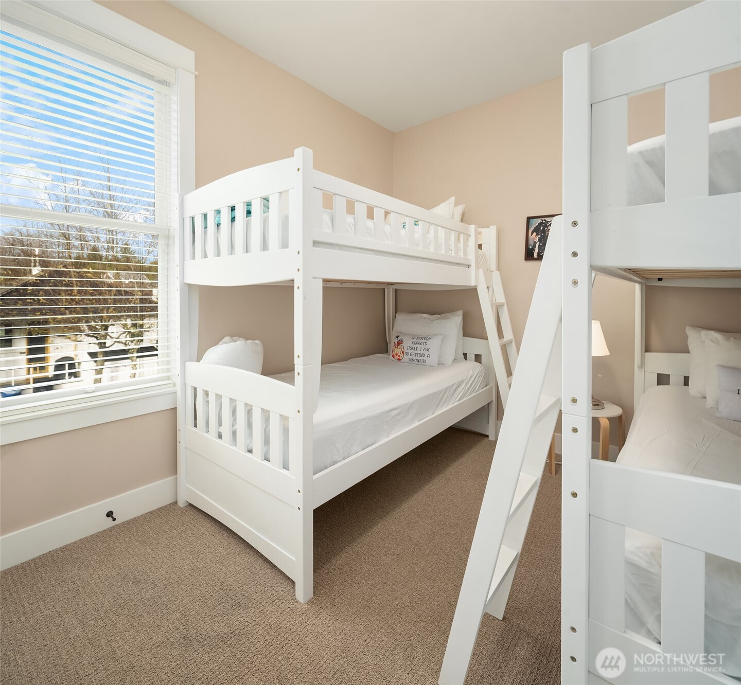 24 Float Lane Pacific Beach, WA 98571 - Photo 18 of 24 a white bed sitting in a room next to a window