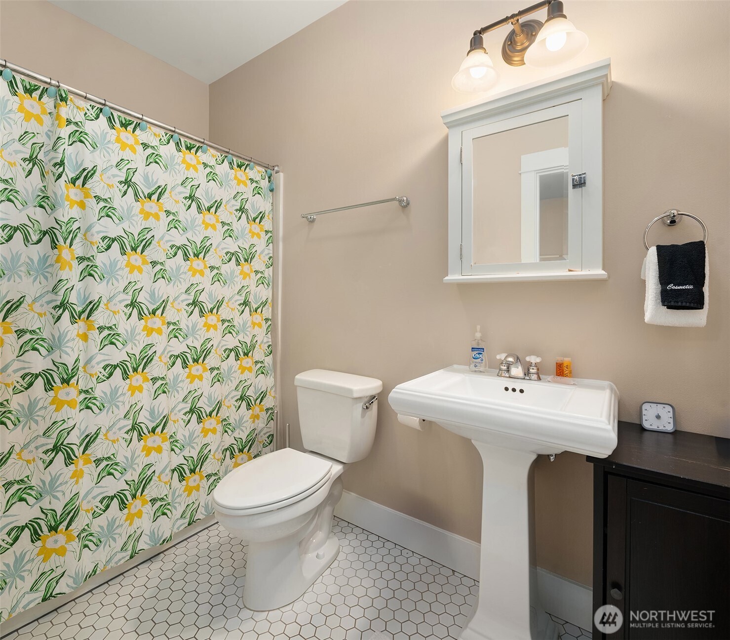 24 Float Lane Pacific Beach, WA 98571 - Photo 20 of 24 a bathroom with a sink toilet and mirror