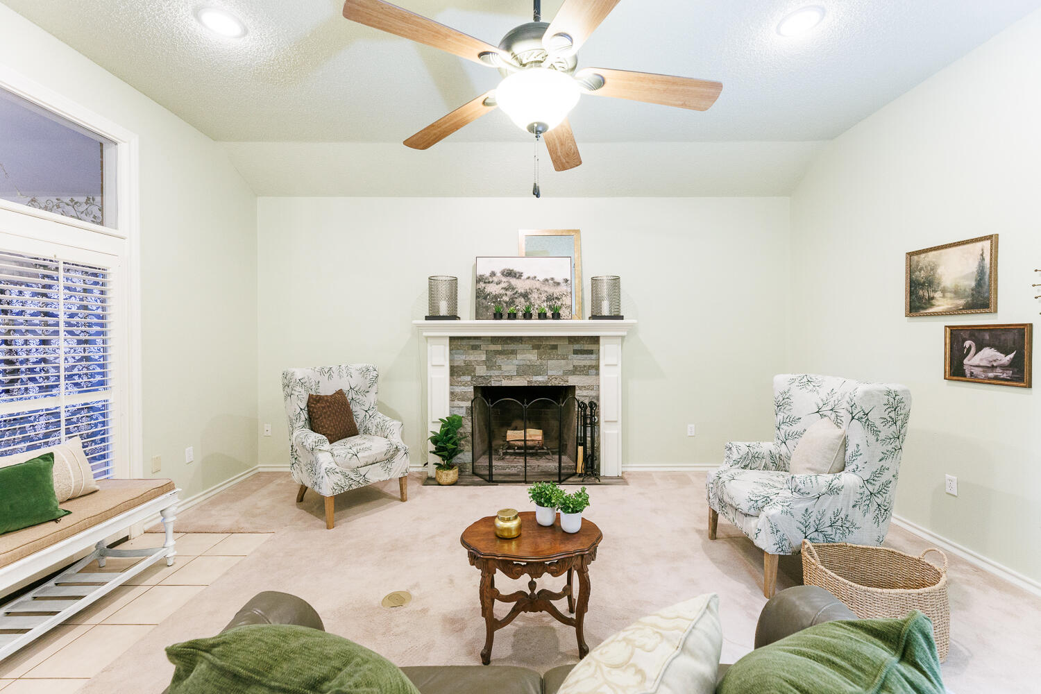 206 Collins Avenue Sundown, TX 79372 - Photo 9 of 82 a living room with furniture a fireplace and a flat screen tv