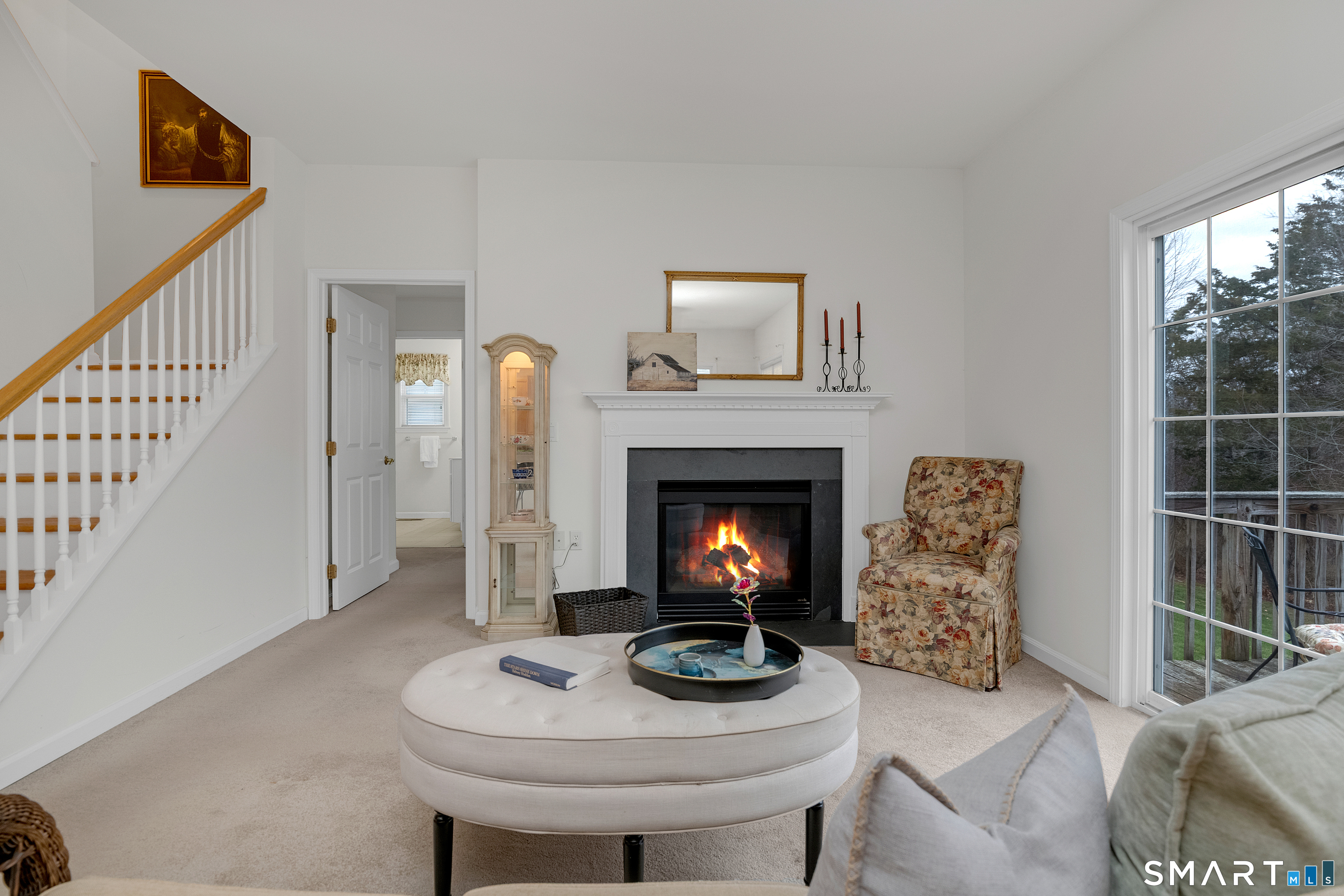 9 Pear Orchard Road, Unit 9 Portland, CT 06480 - Photo 11 of 38 a living room with furniture and a fireplace