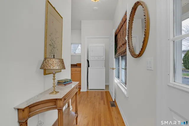 a view of a livingroom with furniture and front door