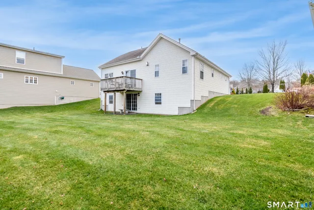 a view of a back yard of the house