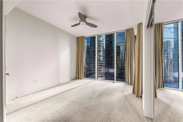 a view of a hallway with a room