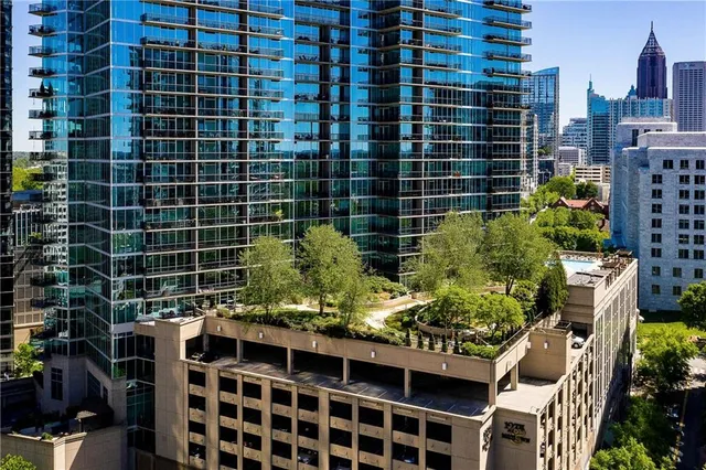 a view of an chairs and tables in the balcony