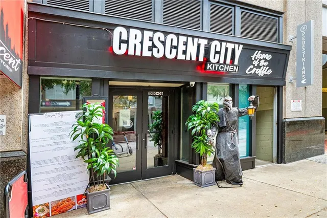 a view of a building with sitting area