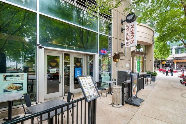 a view of outdoor space with deck and tree