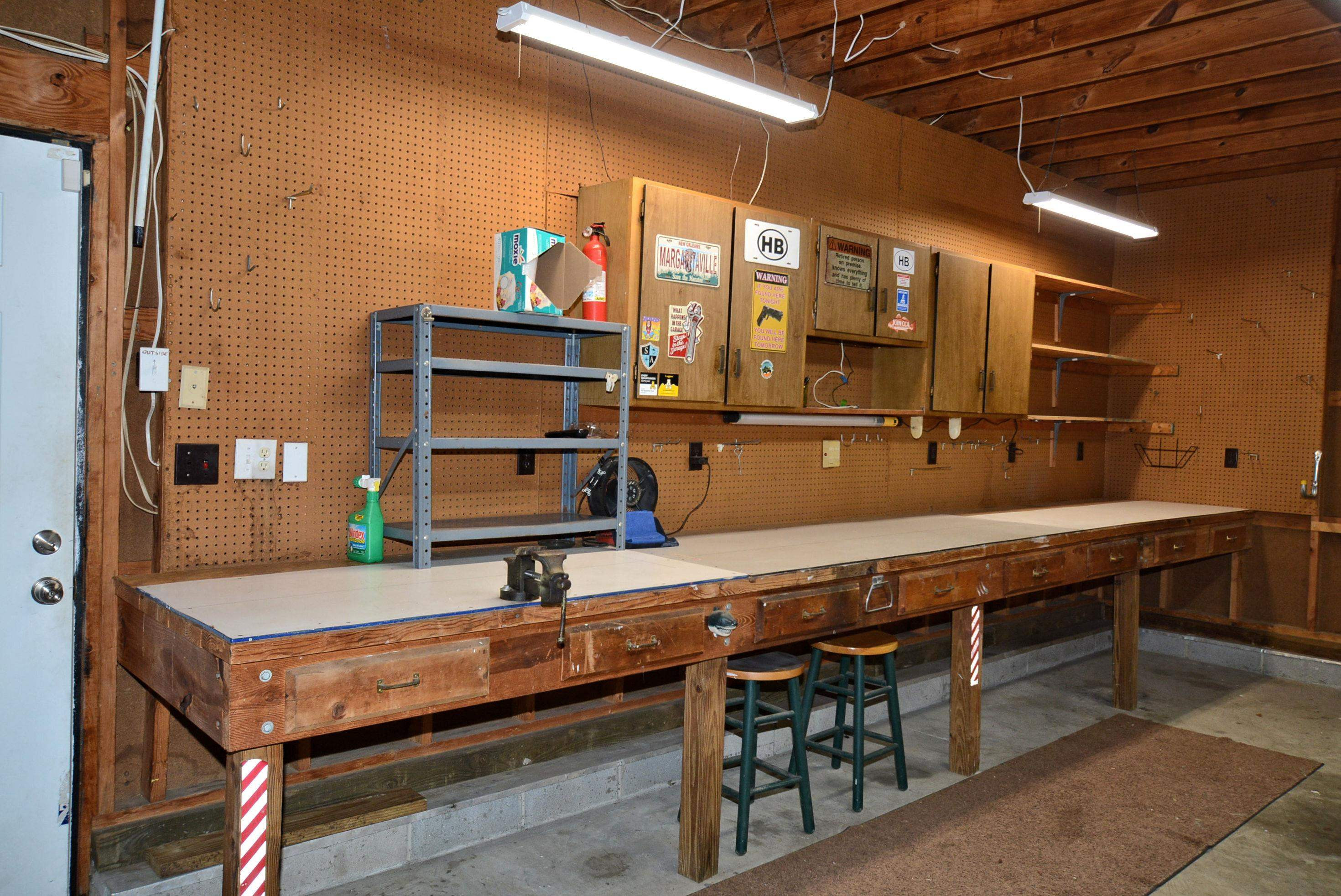 7409 Peppercorn Court Raleigh, NC 27613 - Photo 32 of 47 Garage Work Bench & more Cabinets