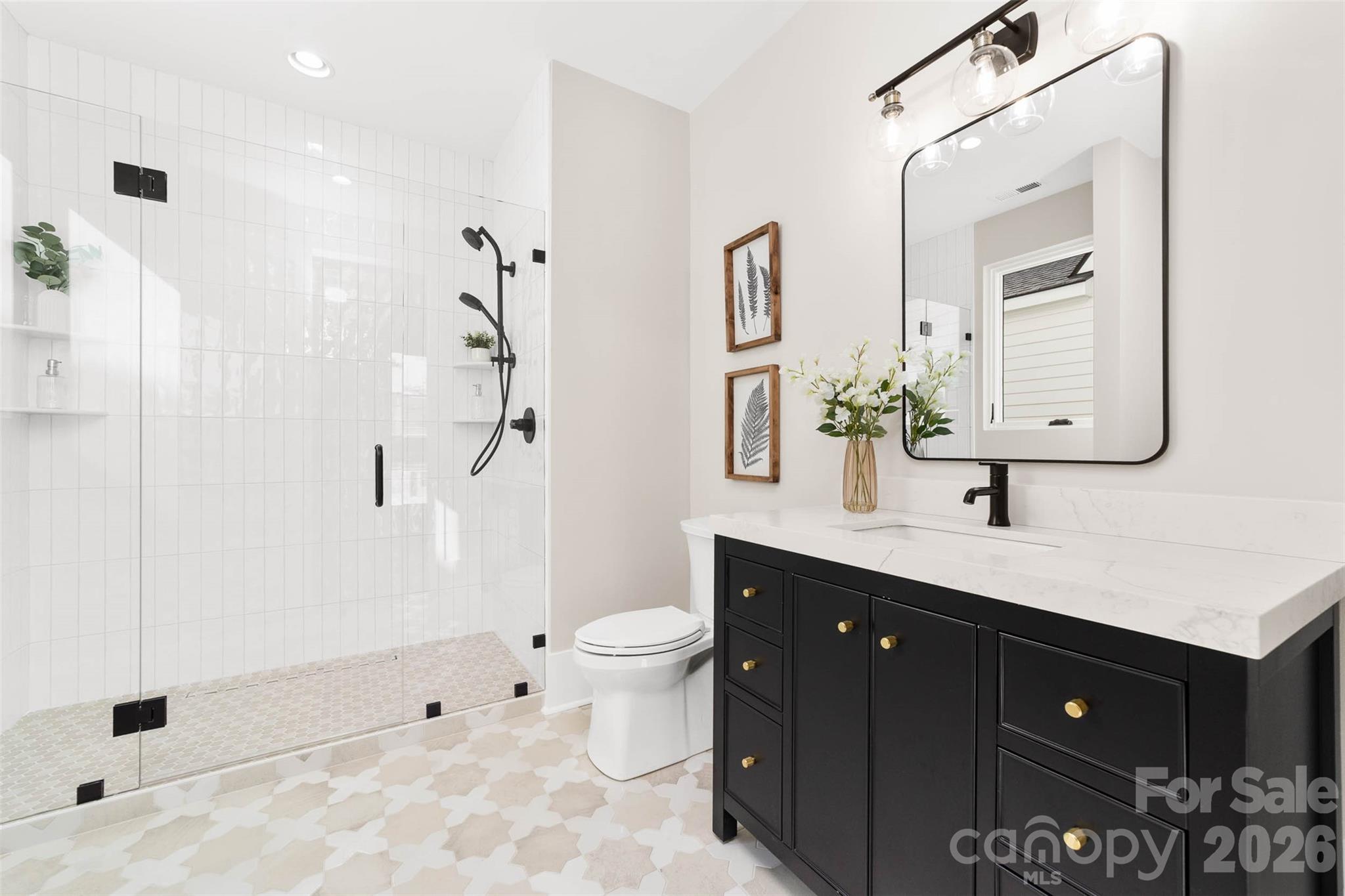 216 Walnut Street Davidson, NC 28036 - Photo 34 of 48 a bathroom with a double vanity sink mirror and toilet