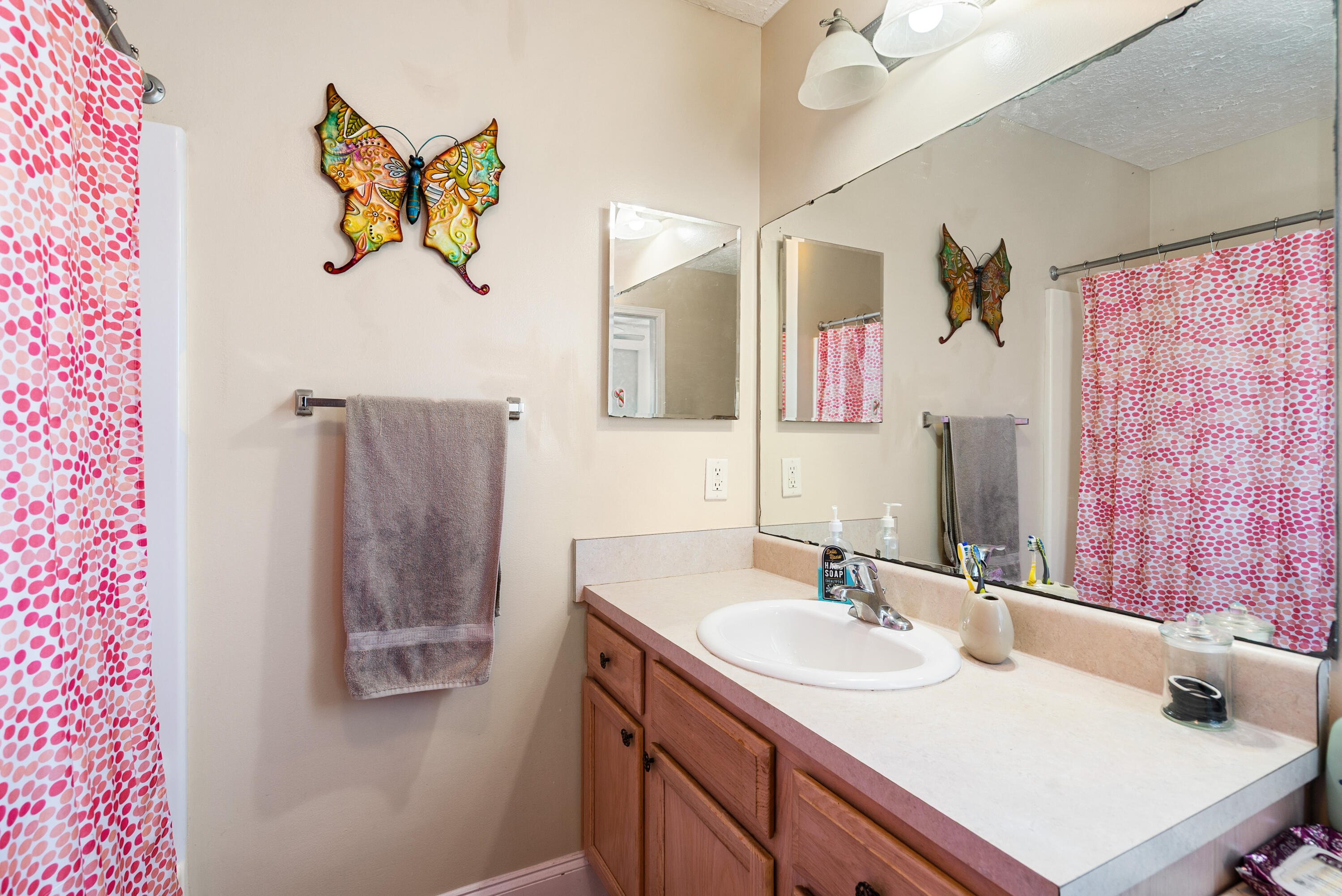 192 2nd Court Key Largo, FL 33037 - Photo 14 of 44 a bathroom with a sink mirror and vanity