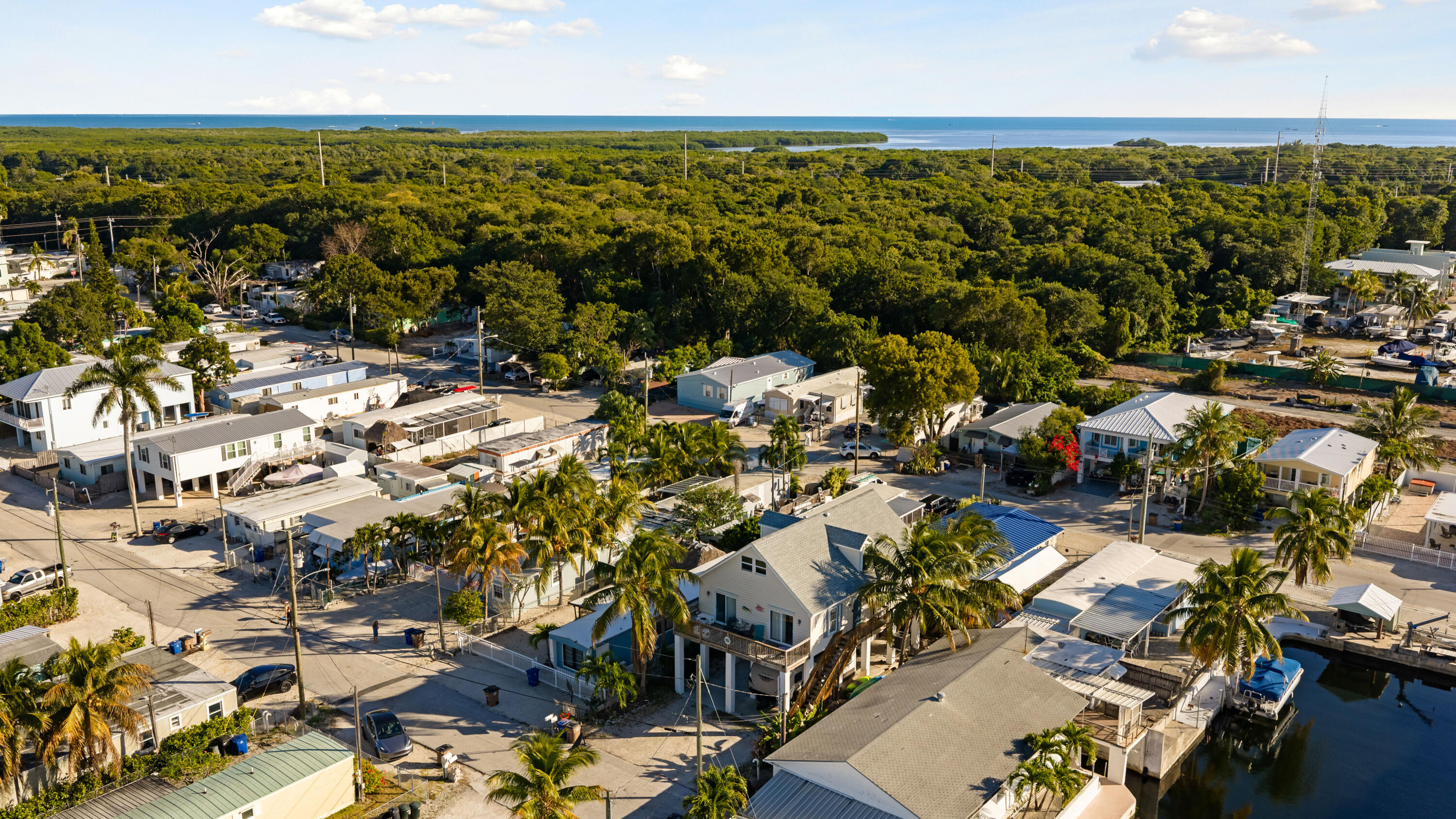 192 2nd Court Key Largo, FL 33037 - Photo 43 of 44 an aerial view of residential building with parking space