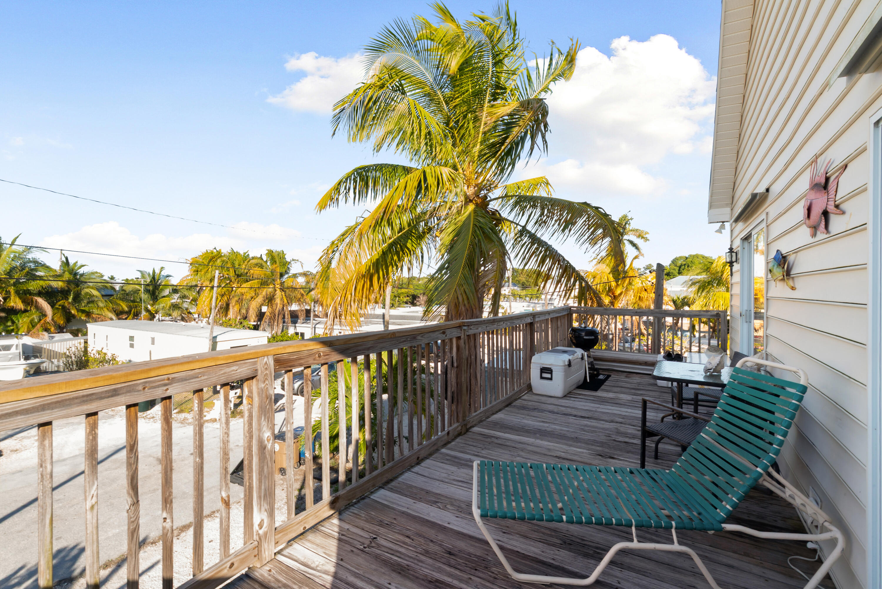 192 2nd Court Key Largo, FL 33037 - Photo 9 of 44 a view of a balcony with chairs