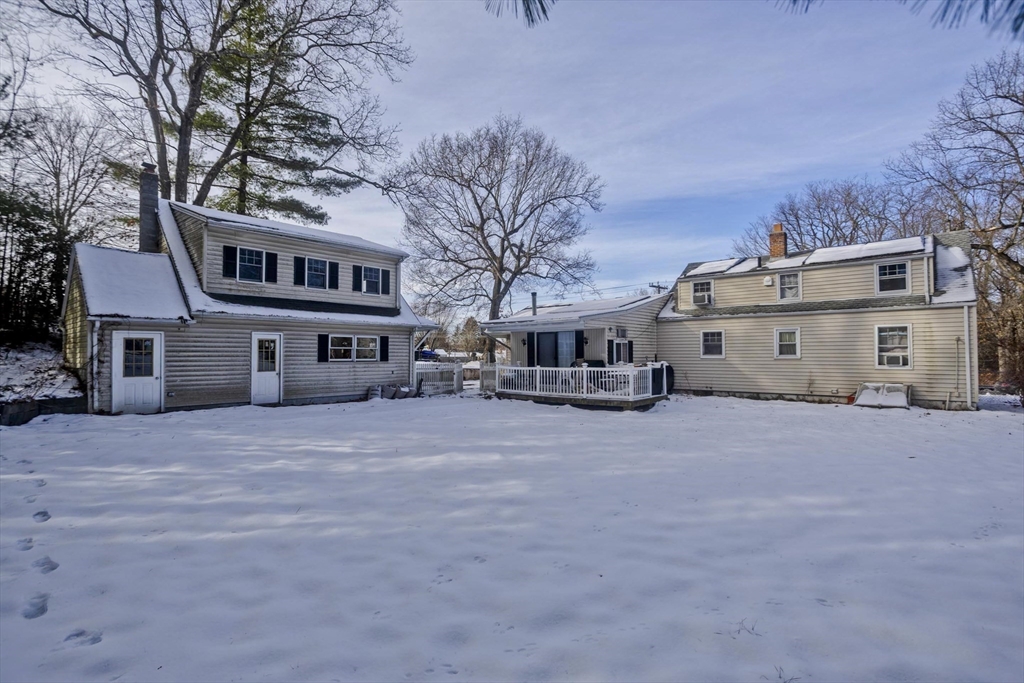 647 Plumtree Road Springfield, MA 01118 - Photo 23 of 23 a front view of a house with a yard and garage