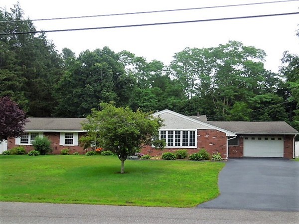 8 Howard Road Chelmsford, MA 01824 - Photo 1 of 30 a aerial view of a house with a yard