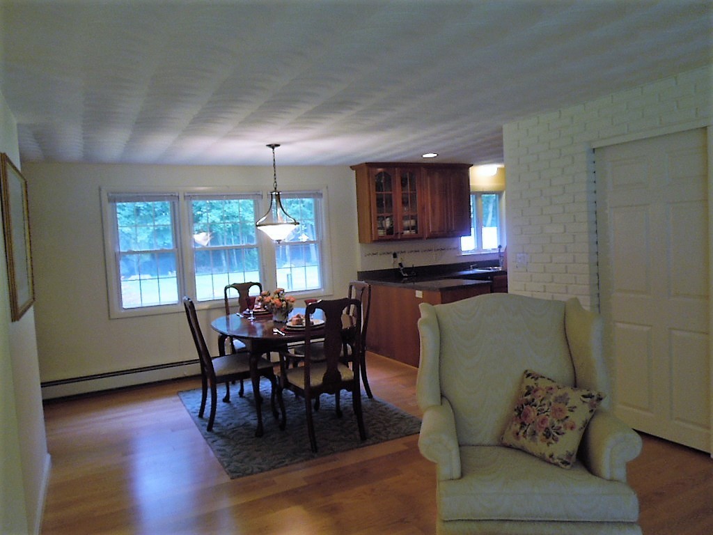 8 Howard Road Chelmsford, MA 01824 - Photo 14 of 30 a dining room with furniture and window