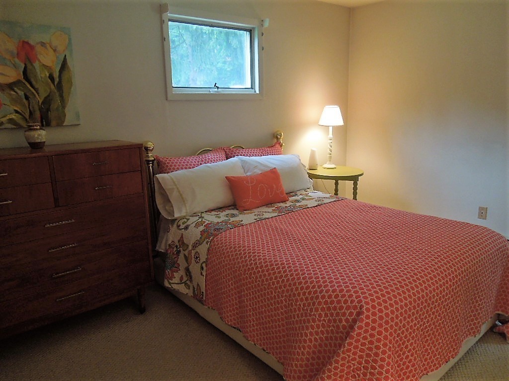 8 Howard Road Chelmsford, MA 01824 - Photo 17 of 30 a bedroom with a bed and a night stand