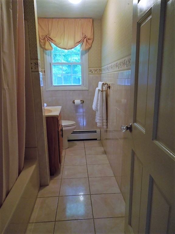 8 Howard Road Chelmsford, MA 01824 - Photo 21 of 30 a bathroom with a window