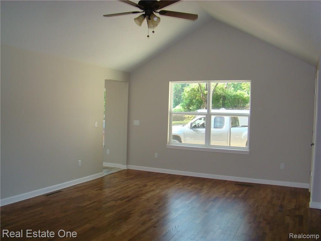 25 North Van Road Holly, MI 48442 - Photo 3 of 25 Living room with beautiful wood floors!