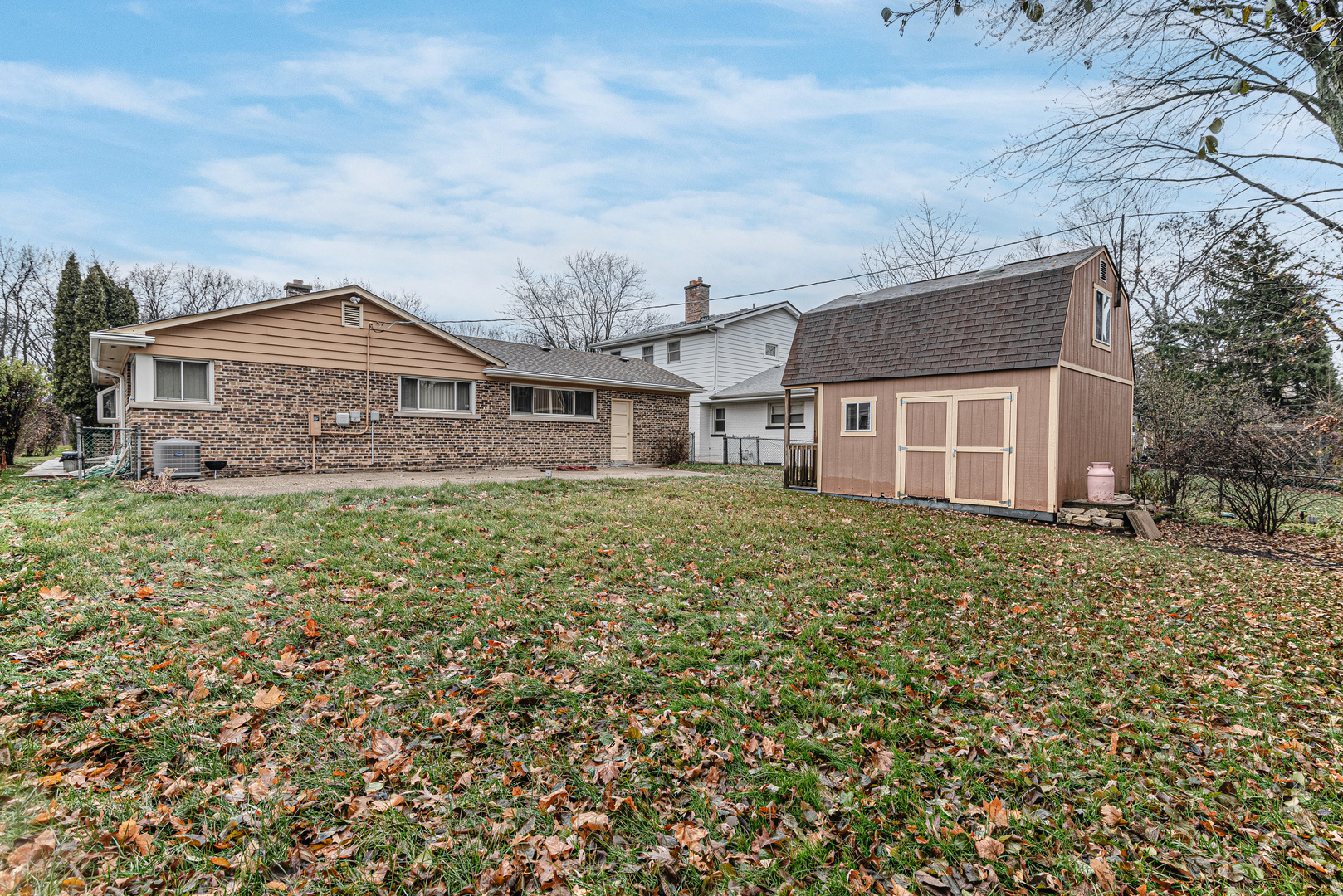 1651 Dundee Road Northbrook, IL 60062 - Photo 23 of 26 front view of a house with a yard