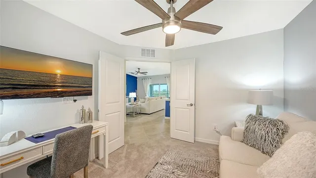 a view of a grassy field with trees