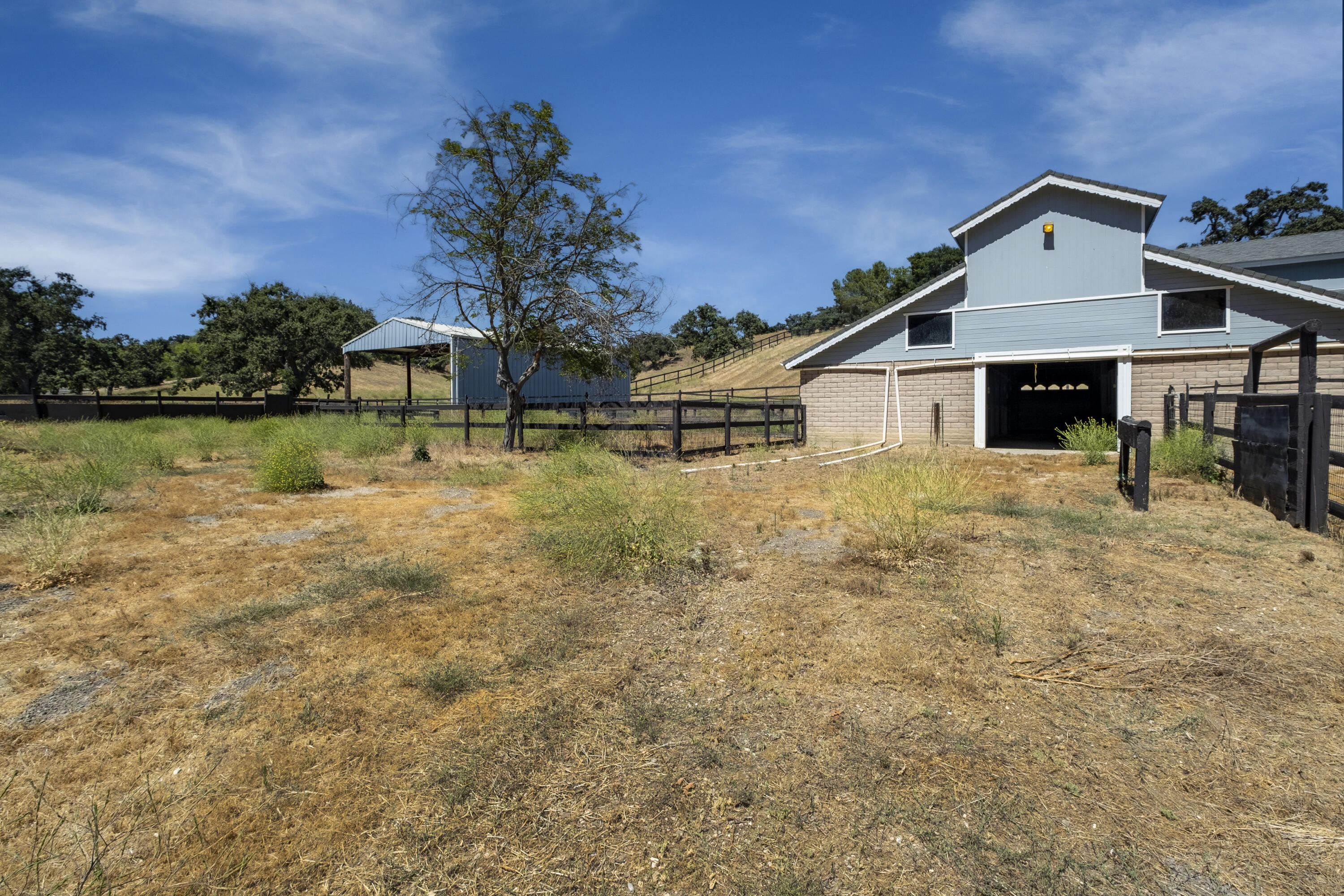 3160 Long Canyon Road Santa Ynez, CA 93460 - Photo 13 of 17 a front view of a house with a yard