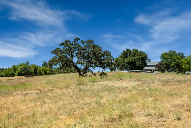 a view of swimming pool and mountain in back