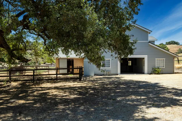 a house view with a outdoor space