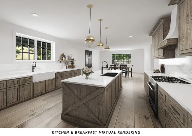 a open kitchen with stainless steel appliances granite countertop a sink stove and wooden floor