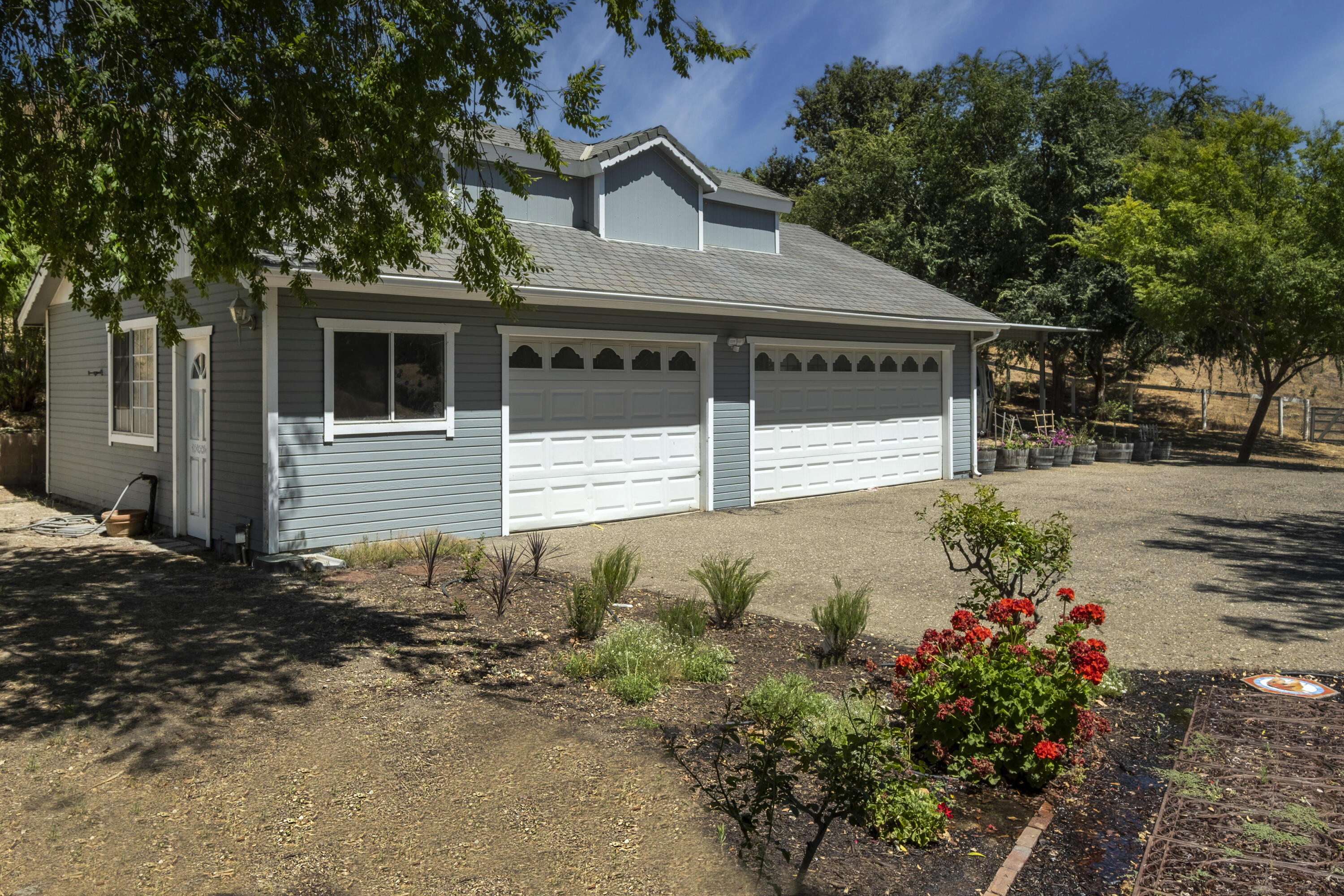 3160 Long Canyon Road Santa Ynez, CA 93460 - Photo 8 of 17 a front view of a house with a yard
