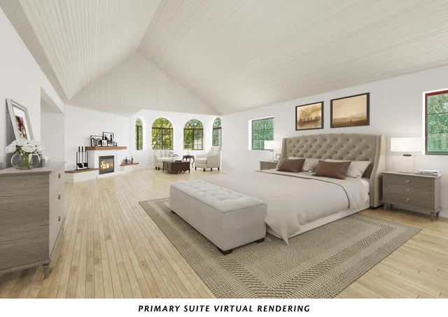 a bedroom with a large bed and a large window