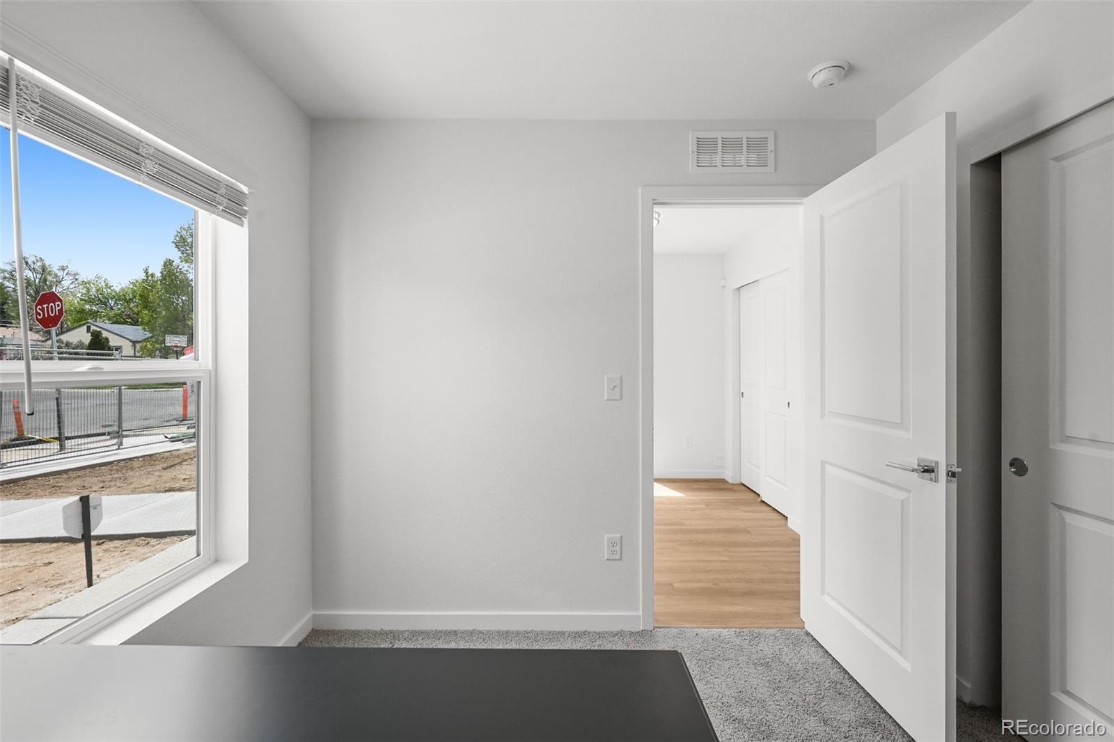 1304 Akron Street Aurora, CO 80010 - Photo 5 of 28 a view of a hallway