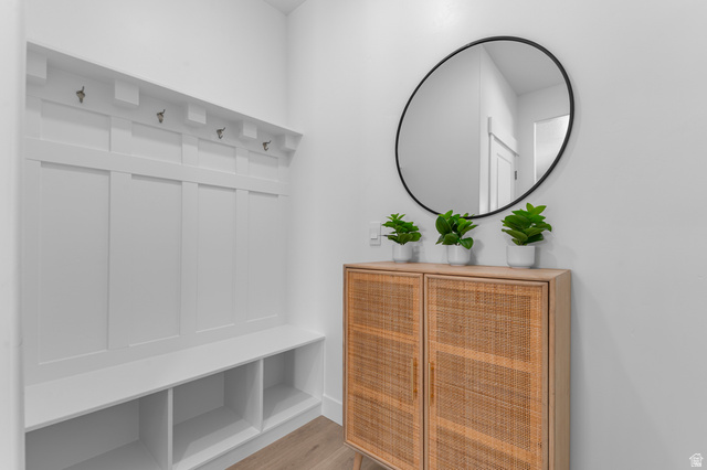 1418 West 2350th South, Unit 15 Perry, UT 84302 - Photo 9 of 22 Built-in entryway storage with bench seating, open cubbies, and coat hooks