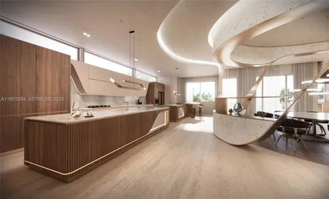 a large kitchen with kitchen island a stove a sink a dining table and chairs