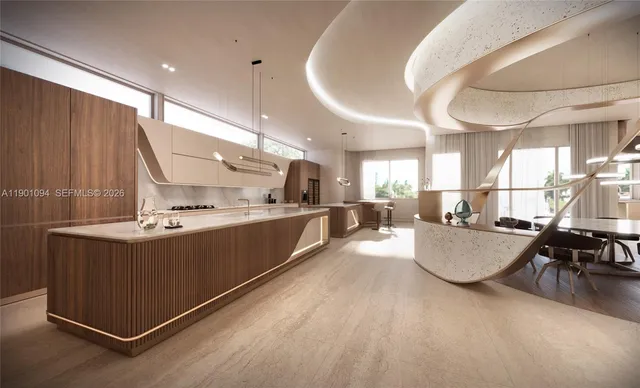 a large kitchen with kitchen island a stove a sink a dining table and chairs