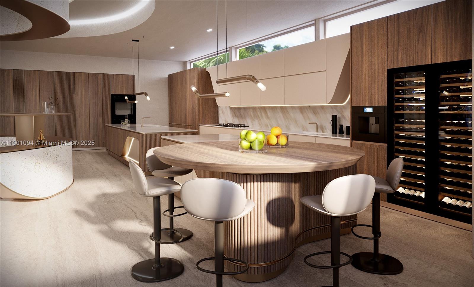 393 Centre Island Golden Beach, FL 33160 - Photo 13 of 31 a kitchen with a table chairs and a stove
