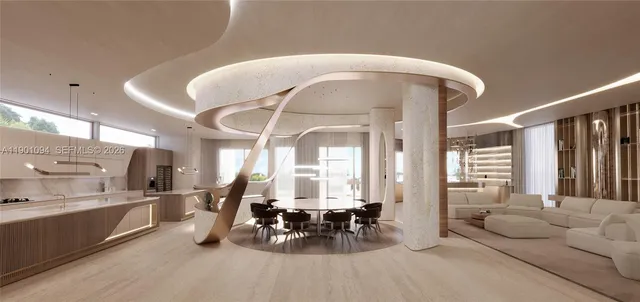 a lobby with furniture and large windows