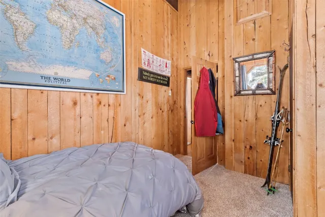 a bathroom with a shower curtain and a window