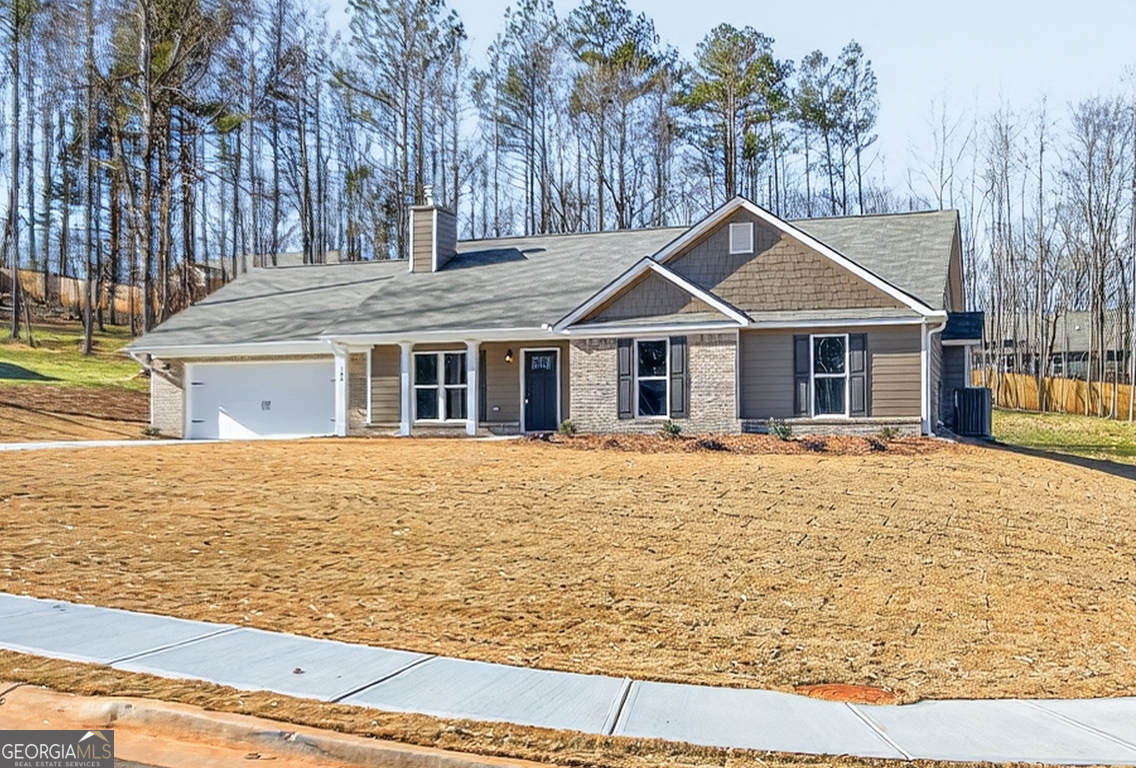 140 Chad Walk, Unit 57 Statham, GA 30666 - Photo 1 of 36 a house with trees in the background