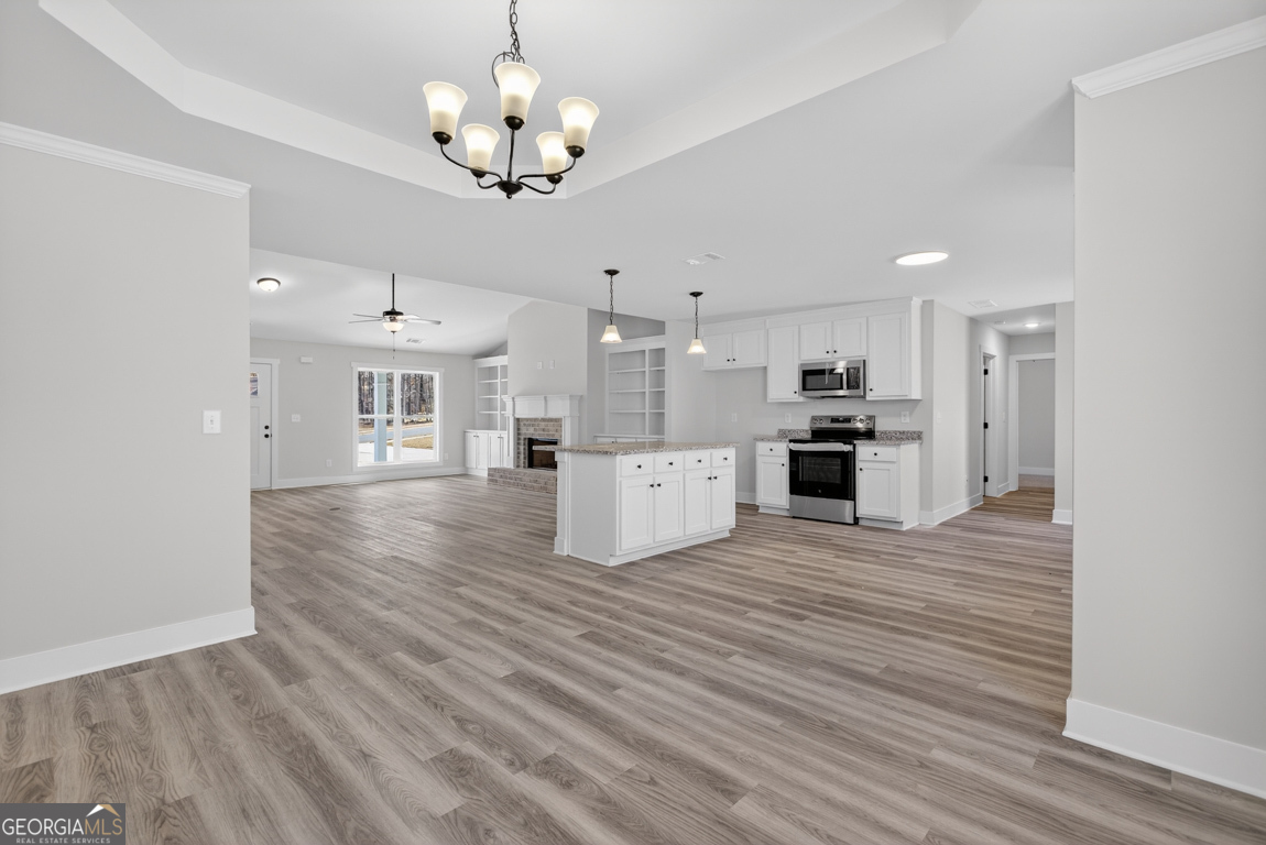140 Chad Walk, Unit 57 Statham, GA 30666 - Photo 15 of 36 a view of kitchen with refrigerator microwave and stove