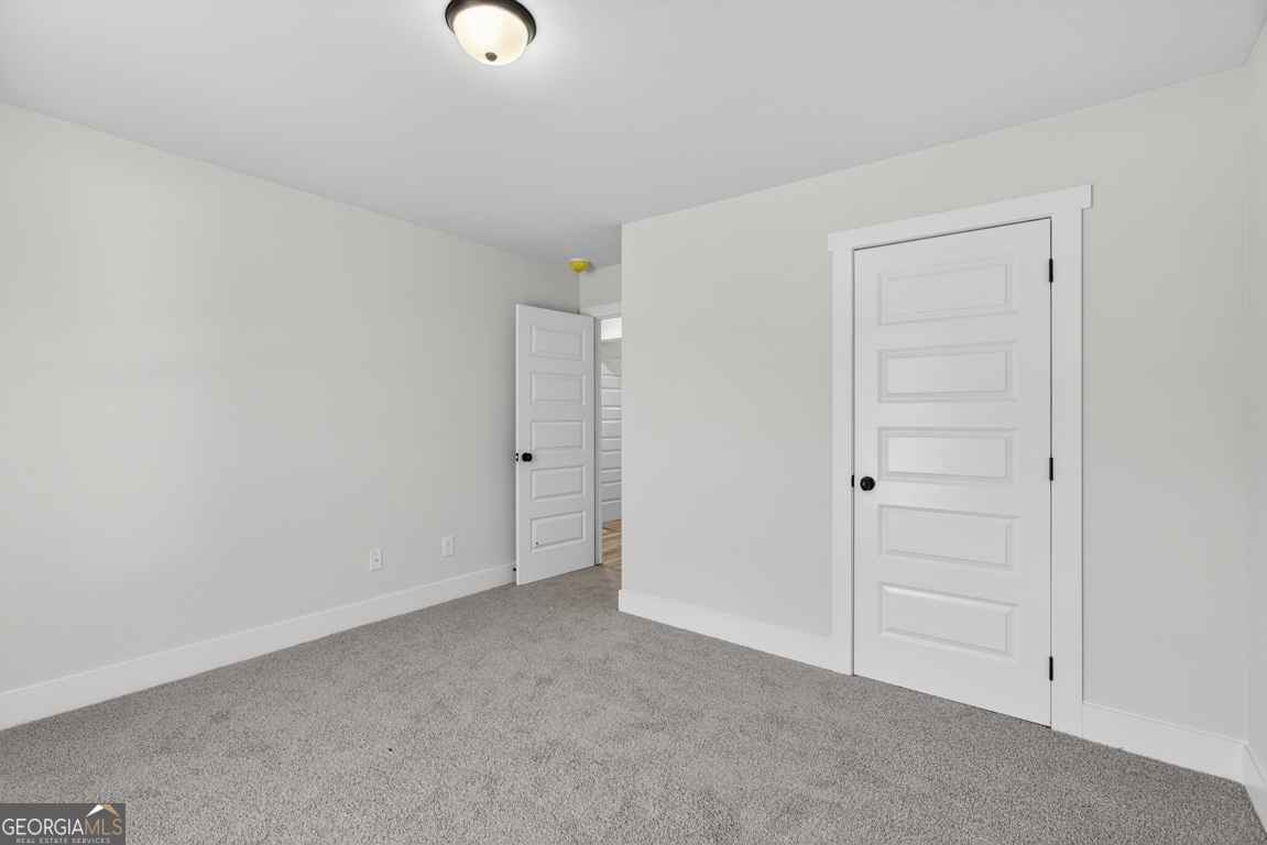 140 Chad Walk, Unit 57 Statham, GA 30666 - Photo 25 of 36 a view of an empty room