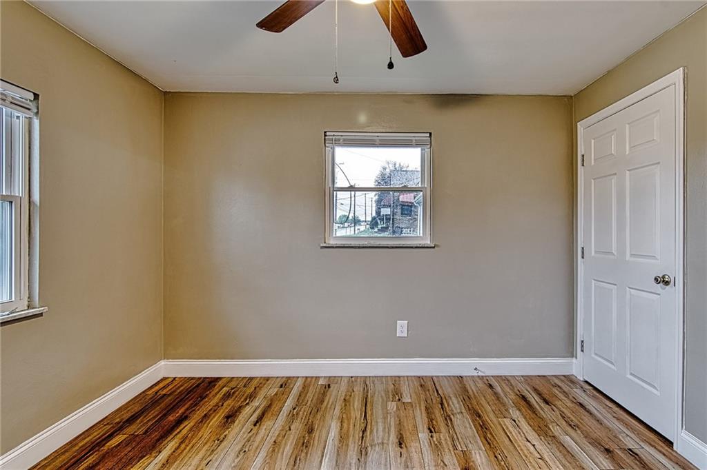 613 Virginia Avenue Rochester, PA 15074 - Photo 15 of 21 an empty room with windows