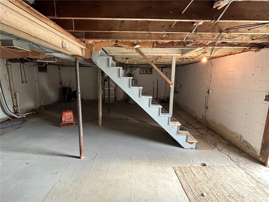 613 Virginia Avenue Rochester, PA 15074 - Photo 19 of 21 a view of an empty room with stairs