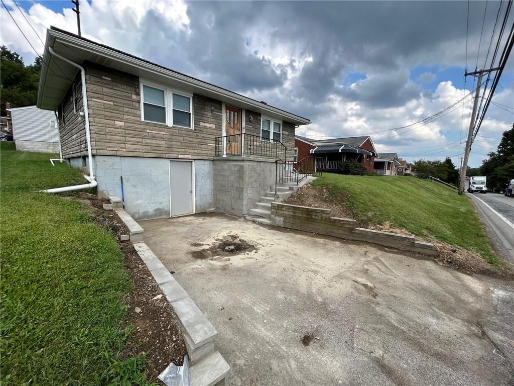 613 Virginia Avenue Rochester, PA 15074 - Photo 21 of 21 a front view of a house with a yard
