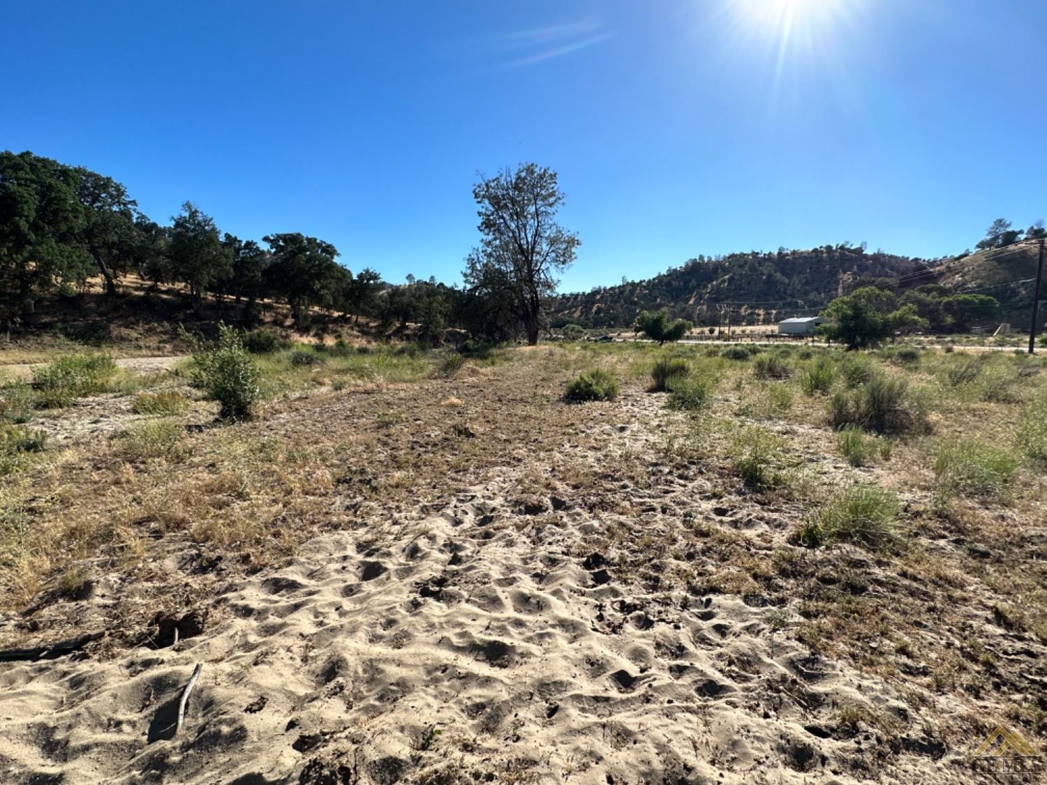 Undisclosed Address Caliente, CA 93518 - Photo 24 of 59 a view of a lake with a city