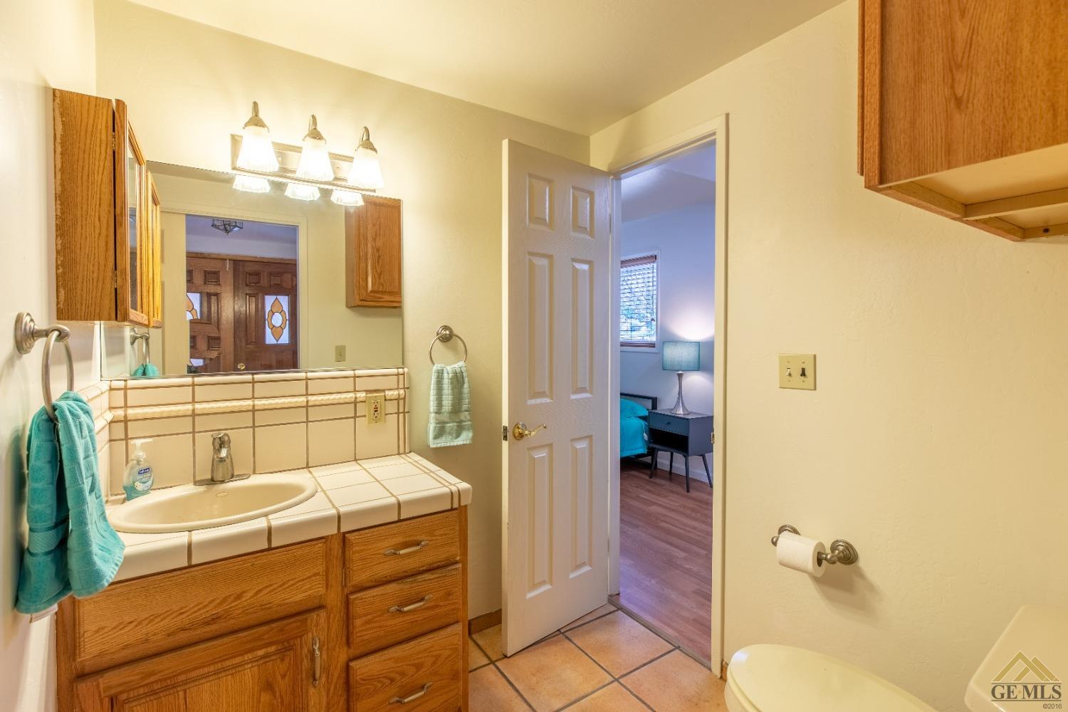 Undisclosed Address Caliente, CA 93518 - Photo 35 of 59 a bathroom with a tub shower and mirror