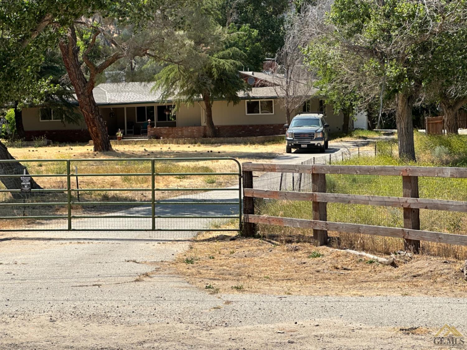 Undisclosed Address Caliente, CA 93518 - Photo 4 of 59 a view of a house with a backyard